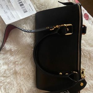 Kelly Tooke black leather purse